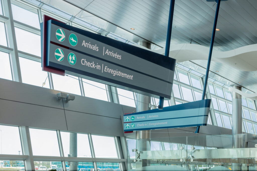 Instruction board to Arrivals and Check-in of St. John's International Airport