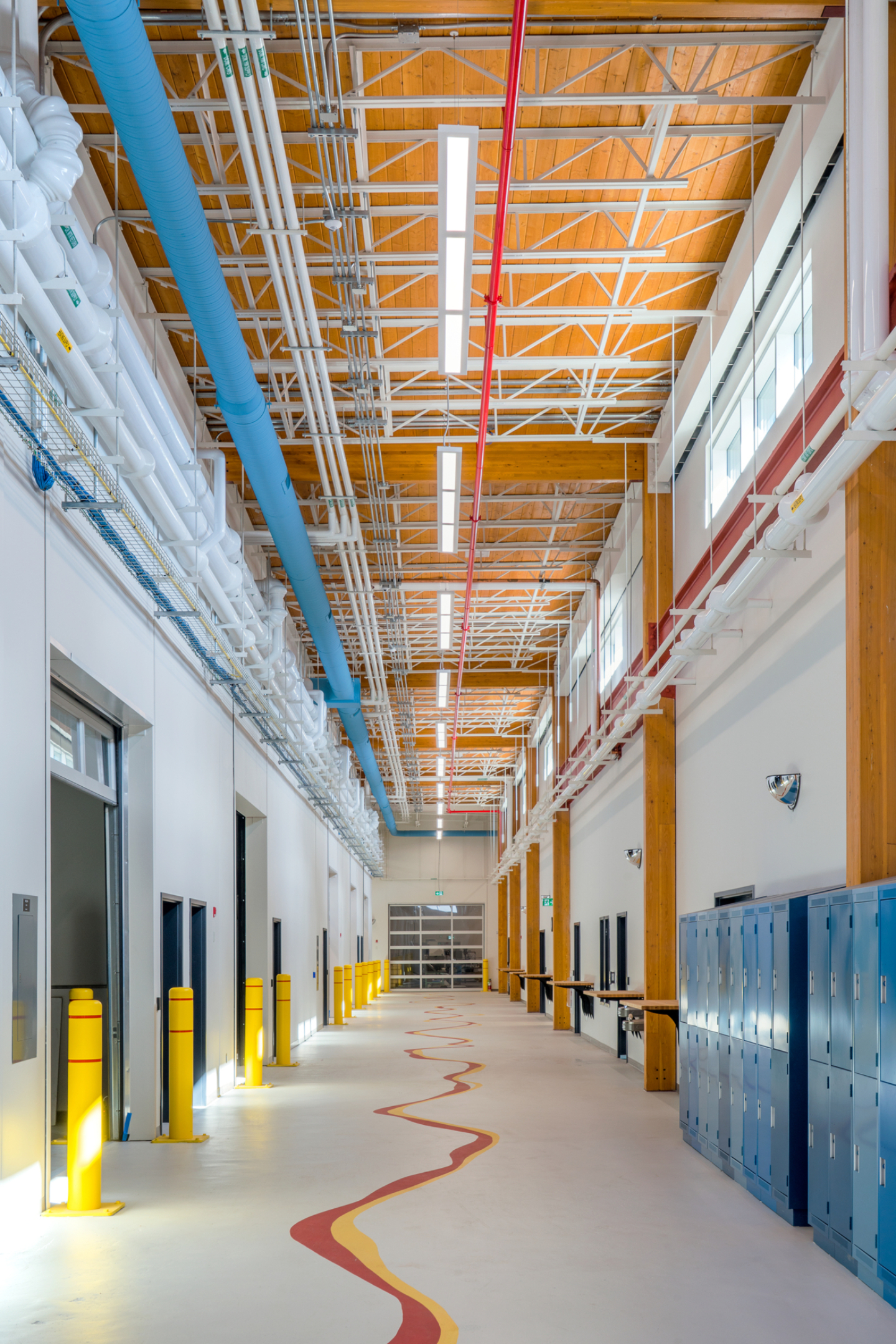 A colorful empty hallway of Confederation College TEC Hub