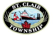 Logo that reads St.Clair Townshop, in the centre of the logo is a maple leaf with two ever greens coming outwards. The centre of the logo has a sailboat on blue waters