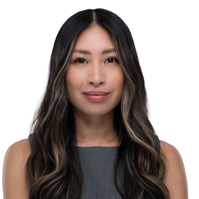 Woman with long brown hair and tan skin poses for a headshot.