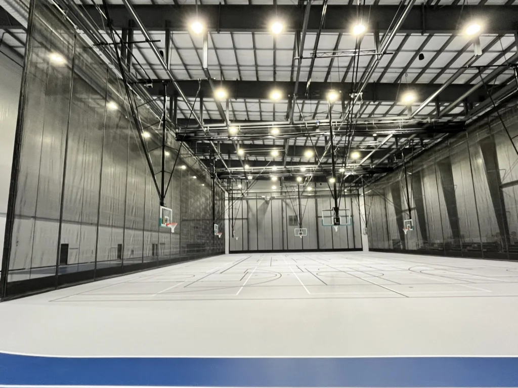 interior of a gymnasium with a basketball court